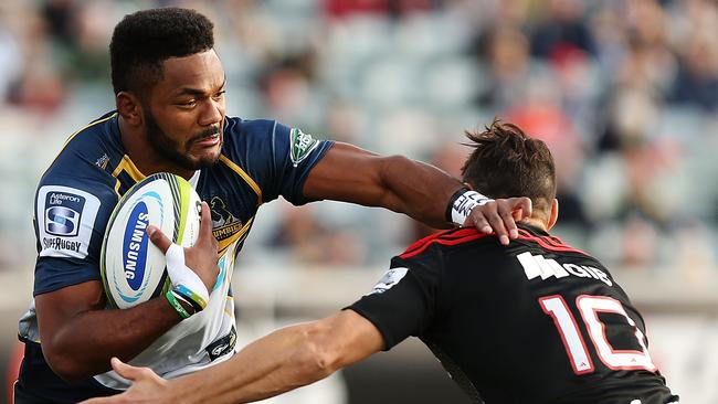 CANBERRA, AUSTRALIA - JUNE 13: Henry Speight of the Brumbies is tackled during the round 18 Super Rugby match between the Brumbies and the Crusaders at GIO Stadium on June 13, 2015 in Canberra, Australia. (Photo by Stefan Postles/Getty Images)