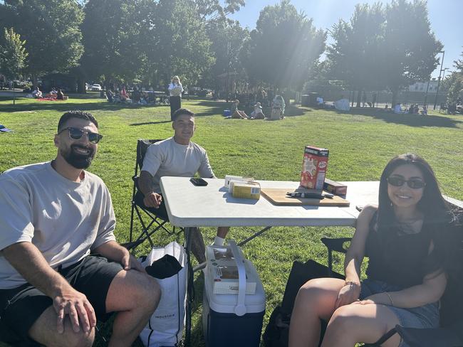 Monica, Justin and James at Williamstown Foreshore for the 2024 New Year's Eve fireworks. Picture: Erin Constable