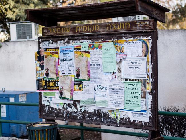 The ultra-orthodox Jewish settlement of Emmanuel does not have the internet, so they communicate on a billboard in the centre of the gated colony. Picture: Franck Bessiere