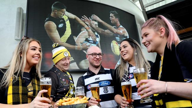 Suzie Quincey, Peter McMahon, Adam Davis, Peter McMahon, Abby McDonough, and Cassie Kersley get ready for the grand final at Morphett Arms. Picture: Dean Martin