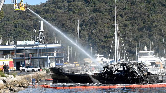 Fire and Rescue extinguish a blaze that destroyed three boats at Church Point Picture: Jeremy Piper