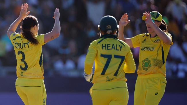 Megan Schutt celebrates with teammates after the dismissal of South Africa's Laura Wolvaardt. Picture: AFP