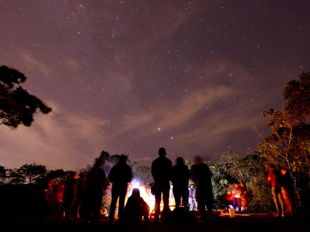 Yanacona indigenous ethnic group members perform the Yachak Yurak (Plants of Wisdom) ritual around a fire in a rural area of Felidia, Valle del Cauca department, Colombia on June 17, 2015, as preparation for the Inti Raymi (Festival of the Sun), which take splace every winter solstice. Picture: AFP