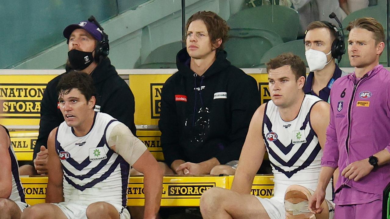 Injured Freo skipper Nat Fyfe sits in the back row after being subbed out of the match. Picture: Michael Willson