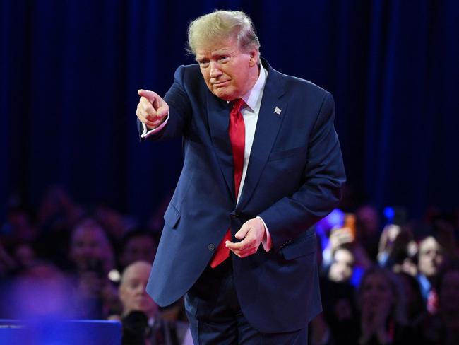 (FILES) Former US President and 2024 presidential hopeful Donald Trump leaves after speaking at the annual Conservative Political Action Conference (CPAC) meeting on February 24, 2024, in National Harbor, Maryland. On March 4, 2024, the US Supreme Court unanimously rejected Colorado's bid to take Trump off primary ballot. (Photo by Mandel NGAN / AFP)