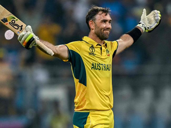 Glenn Maxwell celebrates after his astonishing 201* against Afghanistan, sealed with a six. Picture: Indranil Mukherjee/AFP