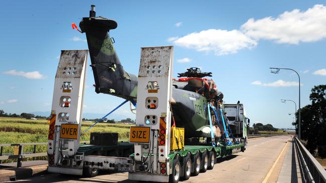 MHR-90 Taipan helicopter crosses the Burdekin Bridge on the back of a truck. Picture: Bryan Lynch