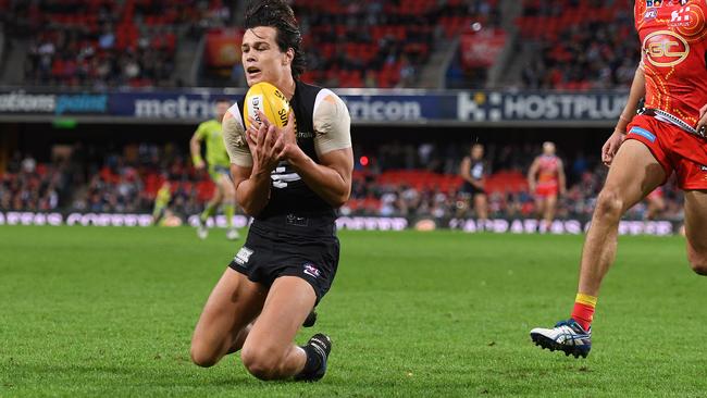 Jack Silvagni marks against Gold Coast during Round 13.