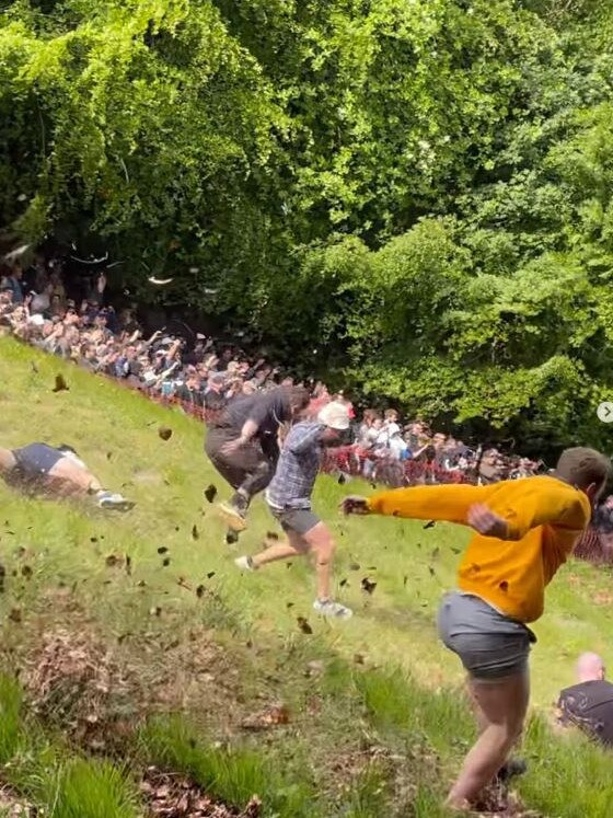 James Maloney chases cheese down a hill.