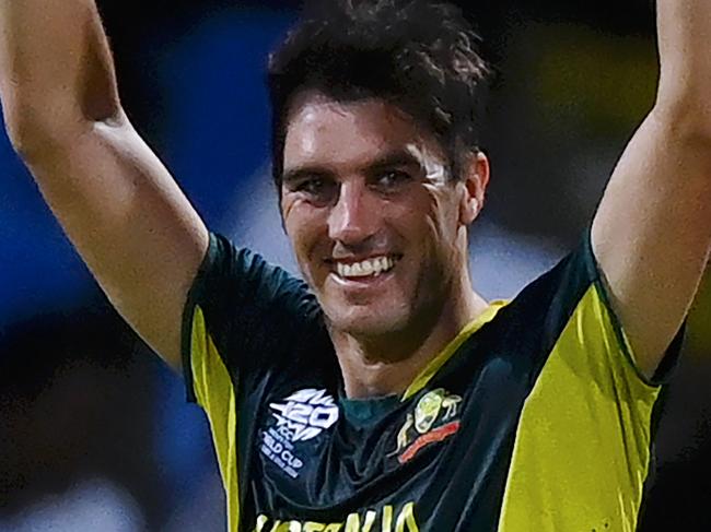 ANTIGUA, ANTIGUA AND BARBUDA - JUNE 20: Pat Cummins of Australia celebrates after dismissing Taskin Ahmed of Bangladesh (not pictured) for his hat trick during the ICC Men's T20 Cricket World Cup West Indies & USA 2024 Super Eight match between Australia and Bangladesh at Sir Vivian Richards Stadium on June 20, 2024 in Antigua, Antigua and Barbuda. (Photo by Gareth Copley/Getty Images)