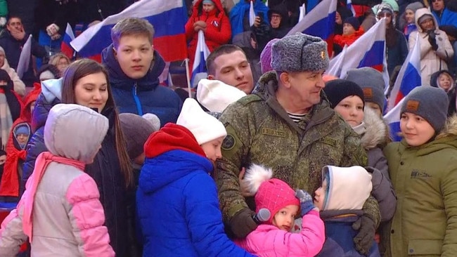 Children who the West claims were abducted by Russia have appeared on stage in Moscow with Russian soldiers. Picture: The Times