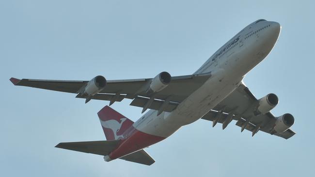 The last Qantas 747 airliner takes off from Sydney on July 22 on its way to the US. Picture: AFP