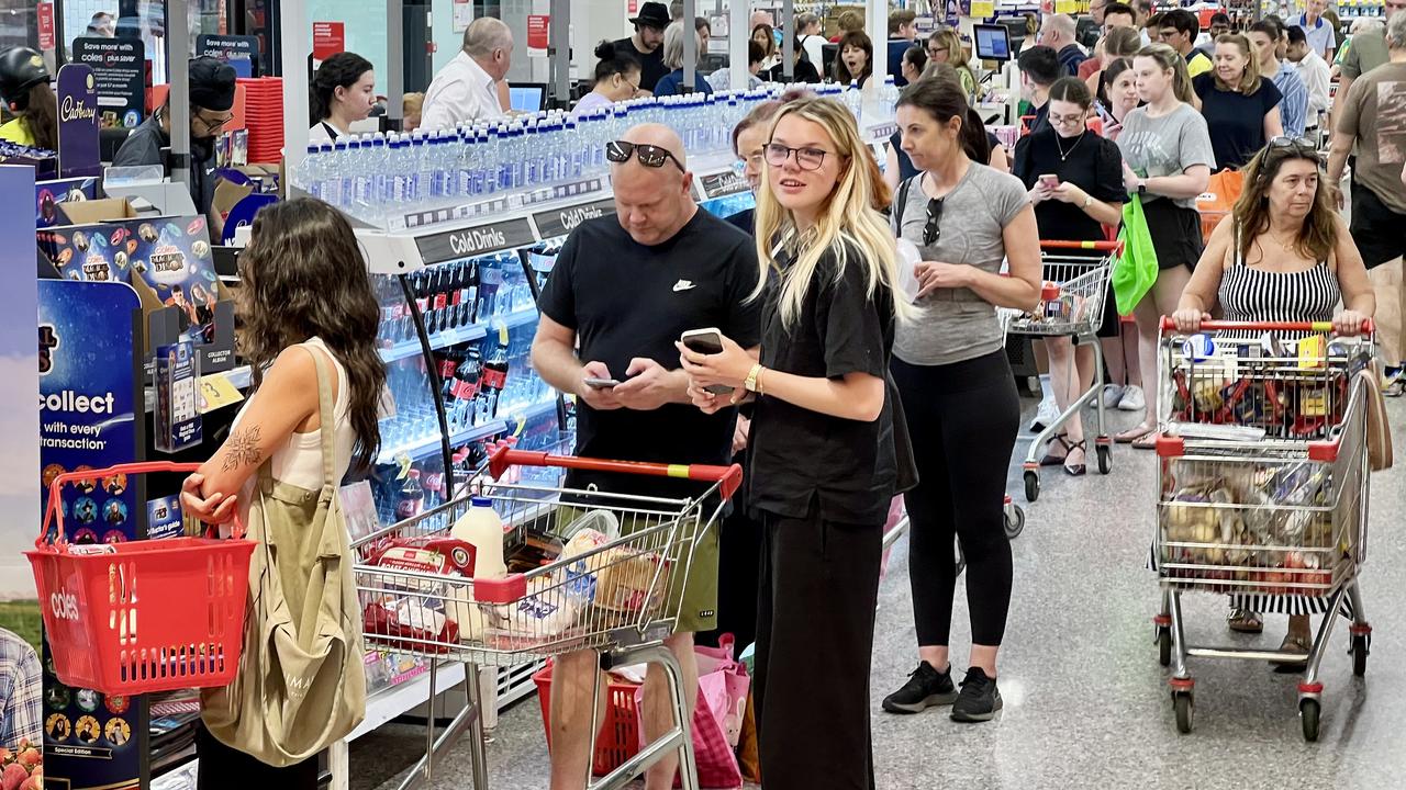 Lines of people at Coles in New Farm, in inner Brisbane.