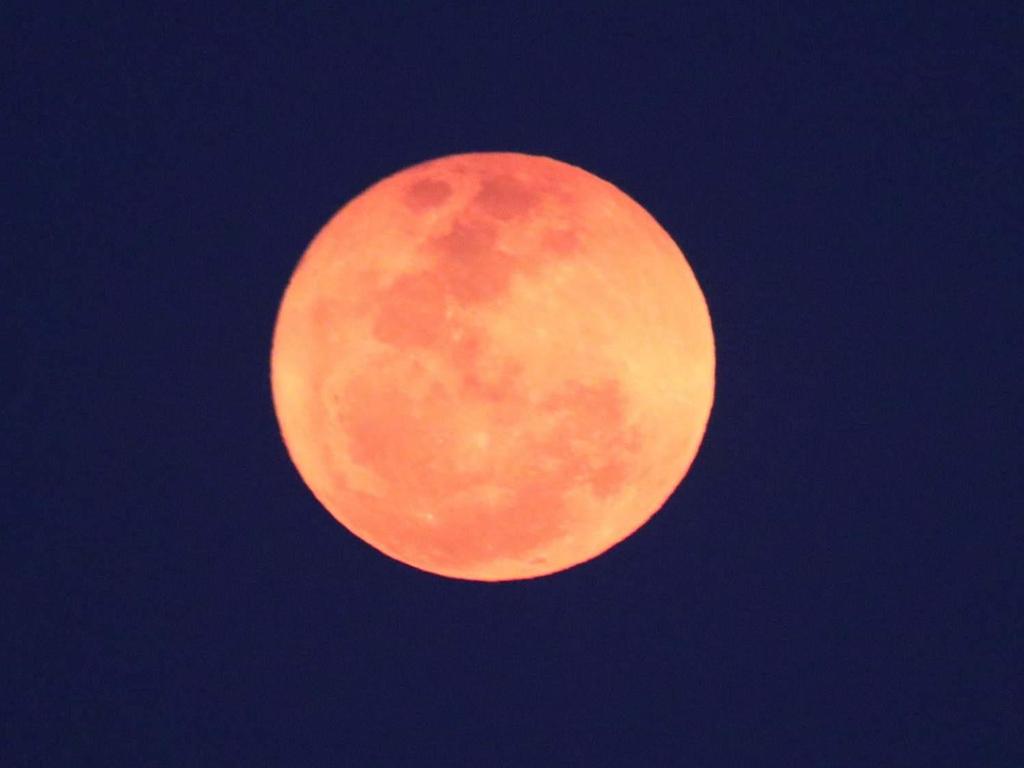 The moon’s light takes on a warmer tone when viewed through Earth’s thicker atmosphere Picture: Kerry Anderson