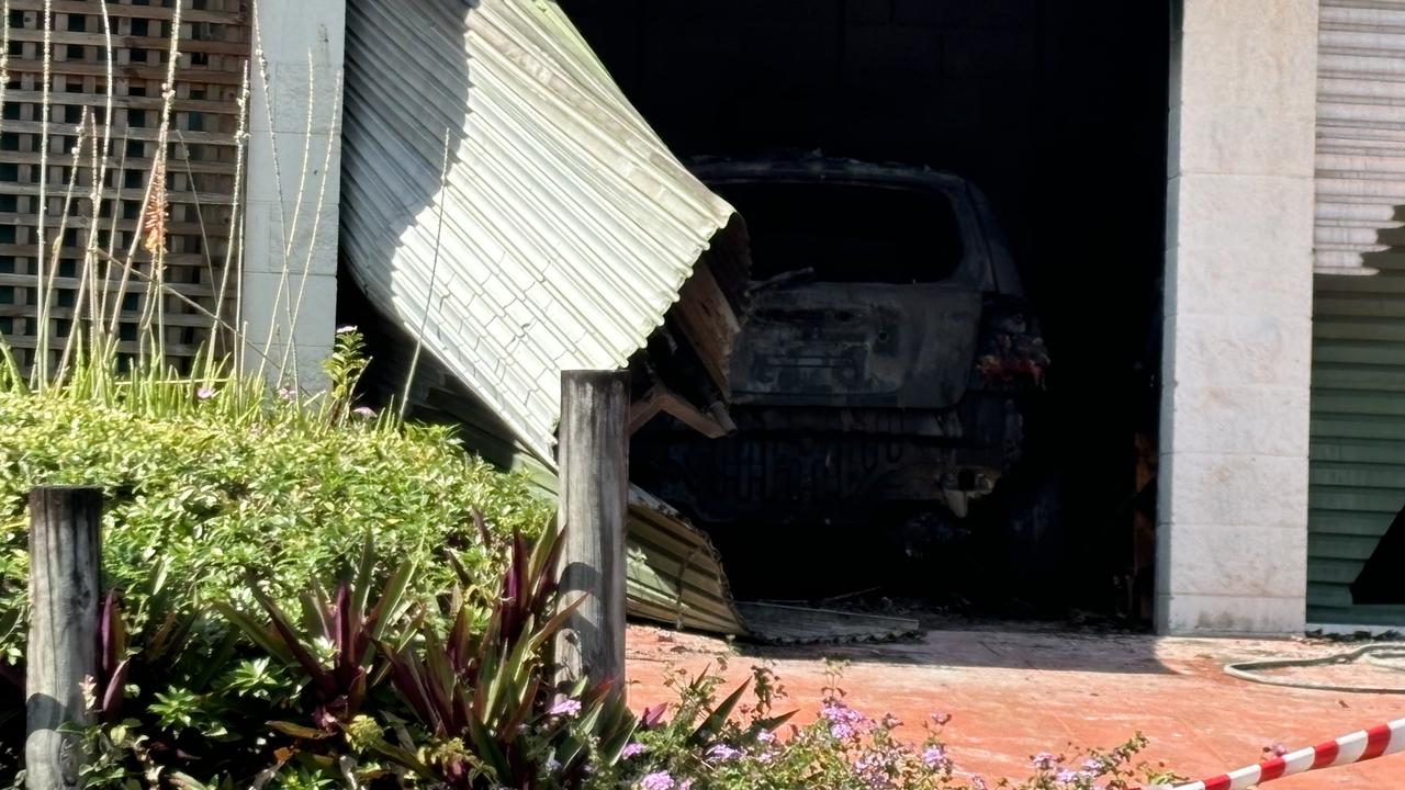 The fire caused major damage to the home with a car entirely burnt out within the garage. Photo: Dylan Nicholson