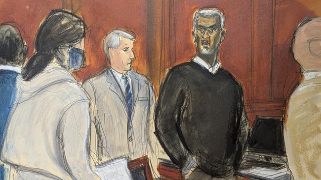Sean 'Diddy' Combs, right, stands and looks at jurors as they file into the jury box. (Elizabeth Williams via AP)
