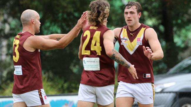 Josh Begley (right) celebrates one of his eight goals on Saturday. Picture: Boronia FNC