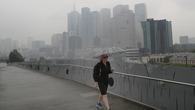 Bushfire smoke haze hangs over the Melbourne CBD. Picture: David Crosling