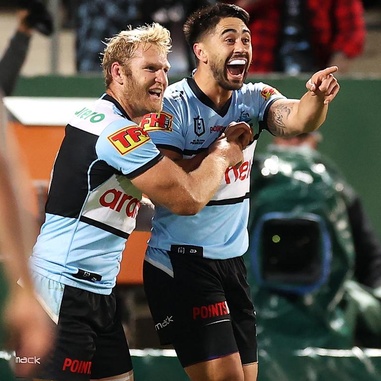 Shaun Johnson of the Sharks celebrates with Aiden Tolman after scoring a try. Picture: Mark Kolbe/Getty Images