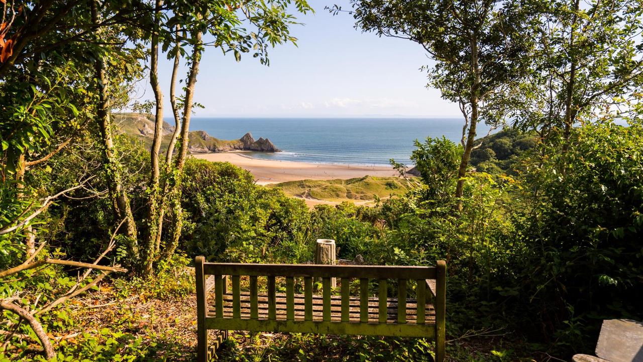 A wooden bench on a clifftop will cost you almost $1mil to buy. Picture: WALES NEWS SERVICE