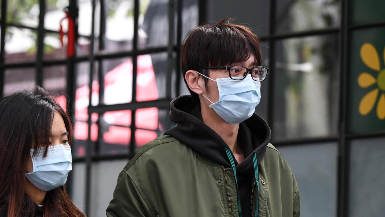 Melburnians wearing masks during the citywide lockdown. Picture: NCA NewsWire / Penny Stephens