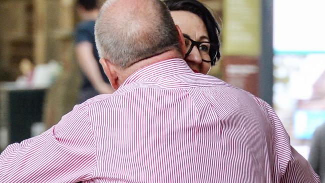 Vickie Chapman gets a hug from Andrew Harris QC as she arrives at the State Administration Centre. Picture: Brenton Edwards