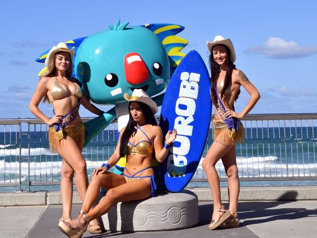 Not even the Gold Coast’s famous Meter Maids were welcome at the Games, but they showed up anyway. Picture: AFP