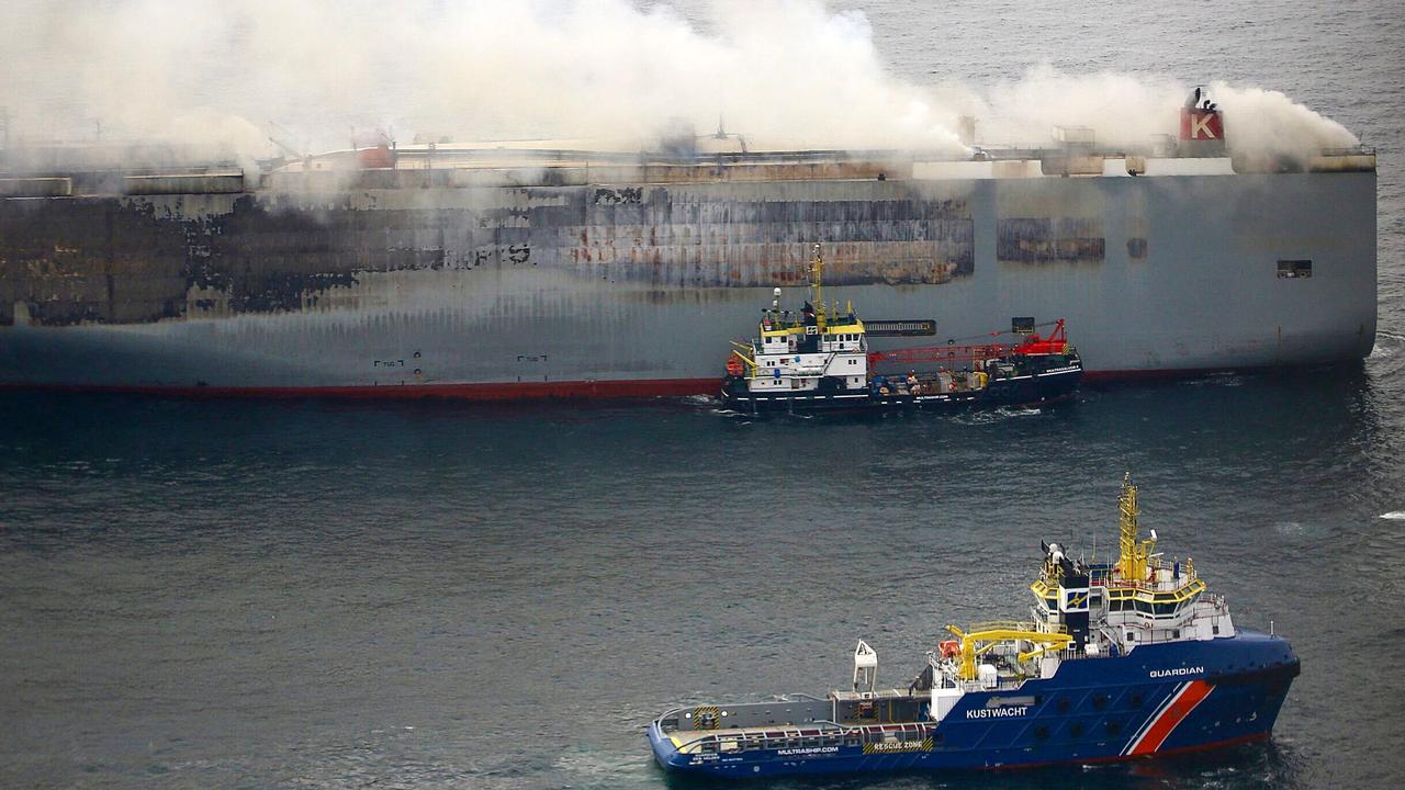 A Multrasalvor 4 rescue vessel sailing next to a fire aboard the Panamanian-registered car carrier ship Fremantle Highway, after a fire broke out on the Fremantle Highway late on July 25, 2023. Picture: Netherlands Coastguards / AFP