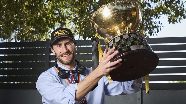 Retiring Glenelg captain Max Proud with the SANFL premiership cup at the club’s Mad Monday celebrations. Picture: Matt Loxton