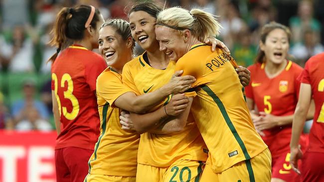 Australian players celebrate after a goal. Picture: Getty Images