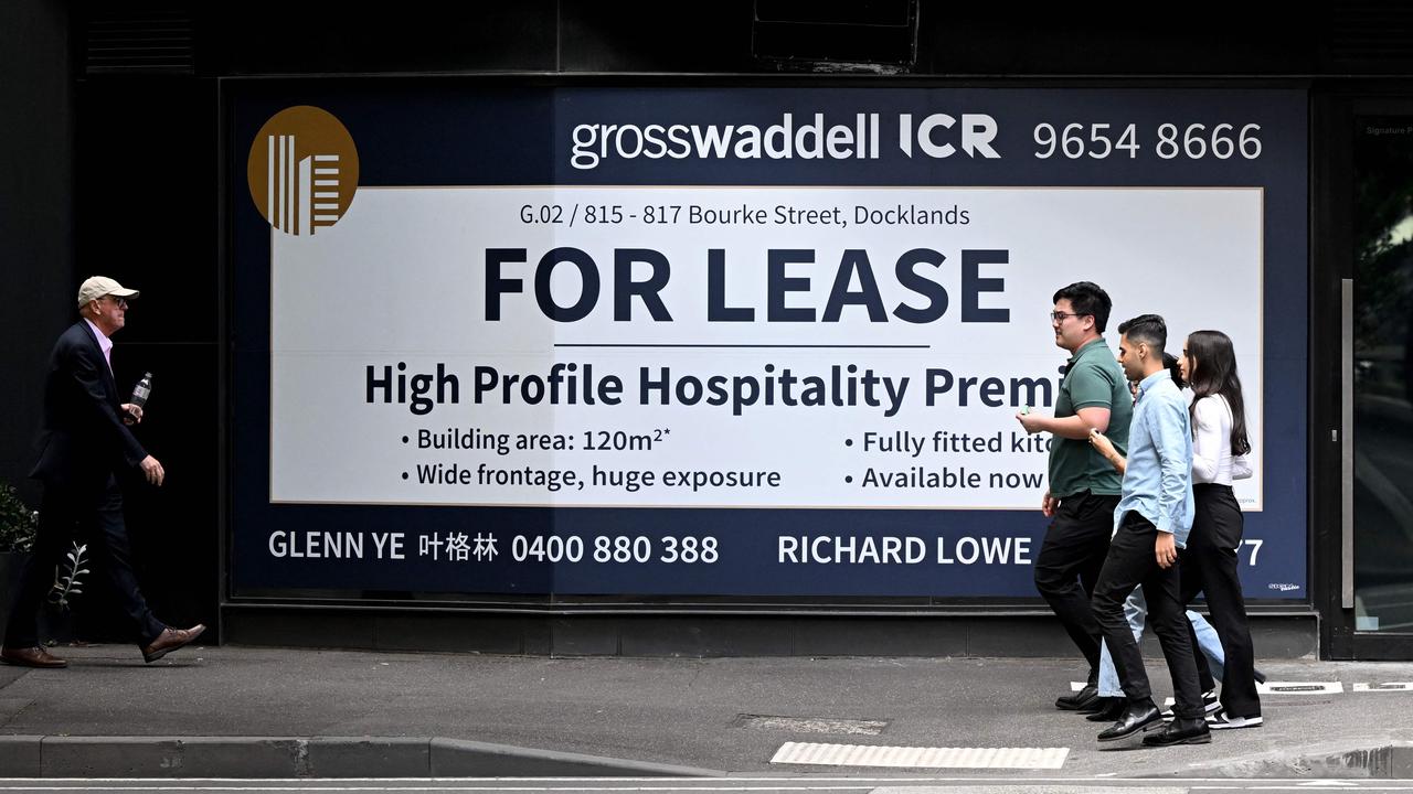 Aussie CBDs have many vacant commercial spaces and for lease signs. Picture: William WEST / AFP