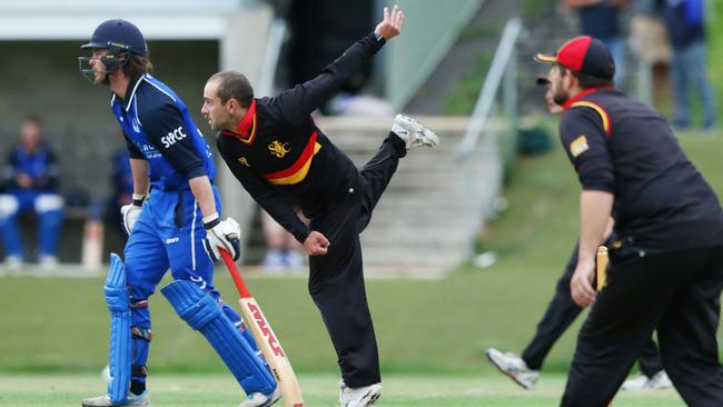 Cameron Port delivers a ball for St Joseph's. Picture: Alan Barber