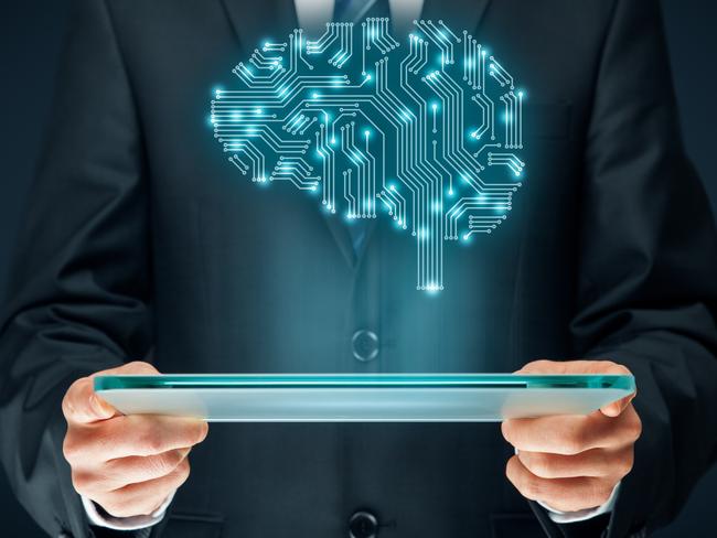 Artificial intelligence (AI), data mining, expert system software, genetic programming, machine learning, deep learning, neural networks and another modern computer technologies concepts. Brain representing artificial intelligence with printed circuit board (PCB) design. Istock