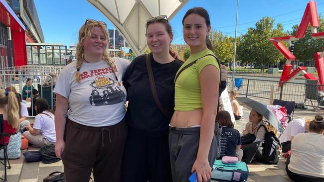 Sarah Russell, Fauve Walker-Damarell and Jo Kloppenborg camped outside the Adelaide Entertainment Centre for 24 hours just to get front row positioning to see British indie-pop band The 1975. Picture: Douglas Smith