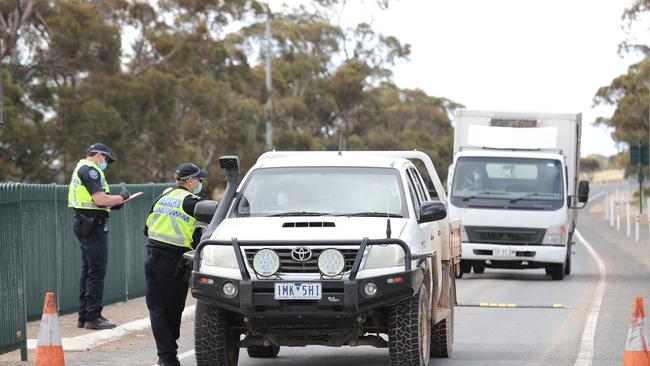 Coronavirus checkpoint: Police check border permits at the South Australian border, near Pinnaroo. Picture: Tait Schmaal.