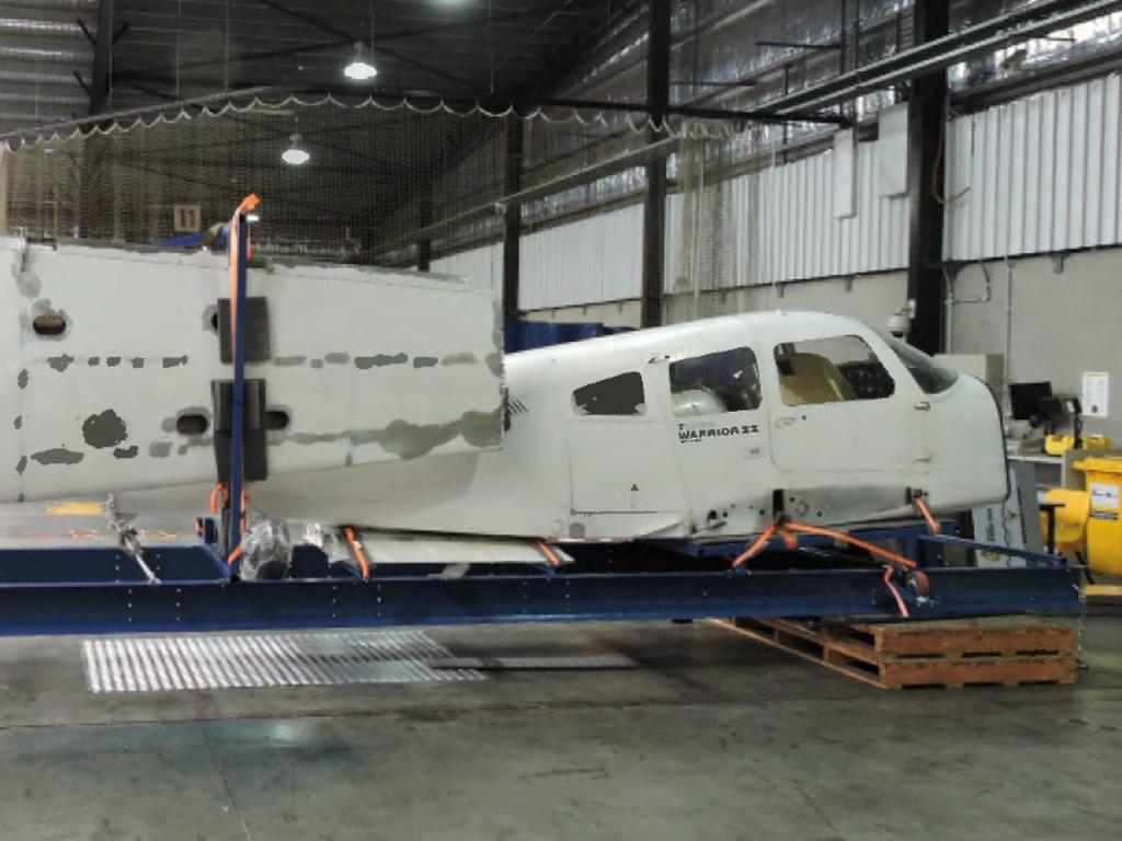 The Piper Warrior plane on the transport stand. Picture: Australian Federal Police