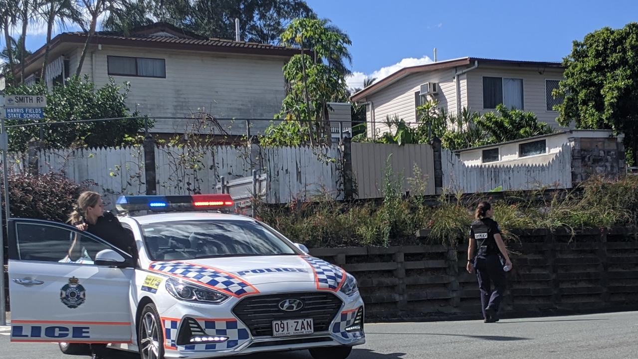 Police at the scene of an emergency situation in Woodridge. Picture: Alex Treacy