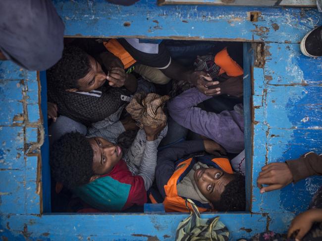 Spot News - Third Prize, Stories Picture: Mathieu Willcocks Title: Mediterranean Migration Eritrean migrants seen cramped in the hold of a large wooden boat which carried approximately 540 men, women, and children. Story: The central Mediterranean migration route, between the coasts of Libya and Italy, remains busy. According to reports by the UNHCR, 5,000 people died while attempting to cross the Mediterranean in 2016. NGOs and charities such as Migrant Offshore Aid Station (MOAS) continue their efforts to patrol the patch of sea north of the Libyan coast, in the hope of rescuing refugees before the potential of drowning. The rescue team on board the MOAS’ Responder are there to mitigate loss of life at sea. Operating like a sea-born ambulance, they rush to assist and rescue refugee vessels in distress, provide medical assistance, and bring the refugees safely to Italy. 2016 was a deadly year of migrants and refugees trying to cross the mediterranean from Libya’s coasts to Italy’s. With ever increasing numbers of unseaworthy boats attempting the crossing, charities and NGOs like MOAS are often overwhelmed. MOAS, together with medical teams from the red cross, operates two rescue vessels, the Responder and the Phoenix, just off the coast of Libya. They sit in international waters and await either the distress call from migrants lucky enough to have been given a satellite phone by their smuggler, or to visually find migrants boats - often in the dead of night. Then the race to rescue them before it too late starts. © Mathieu Willcocks/MOAS.eu 2016, all rights reserved.