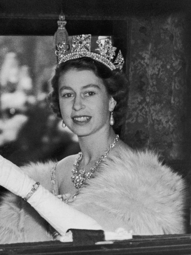 Queen Elizabeth on her way to her first State Opening of parliament as monarch on November 4, 1952. Picture: Douglas Miller/Keystone/Hulton Archive/Getty Images