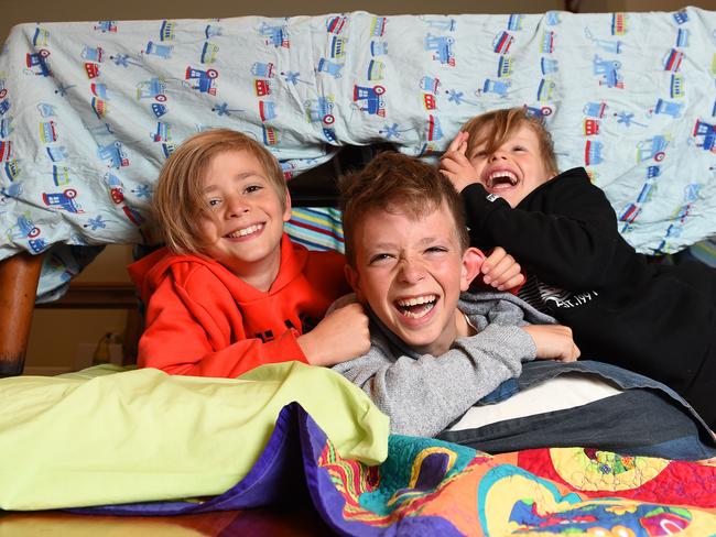 Not-so-bored brothers Charlie, 10, Luis, 12, and Felix Bettinsoli, 7. Picture: Josie Hayden