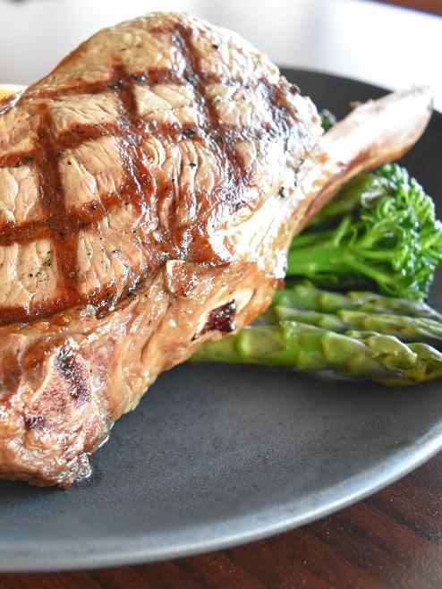 Steak with beautifully steamed greens at Breakers Country Club.