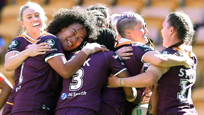 Broncos players celebrate following a try against PNG Orchids at Suncorp Stadium. Picture: AAP