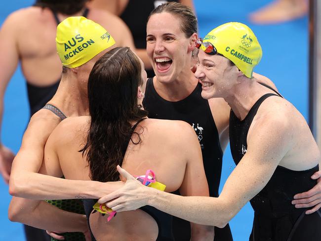 TOKYO, JAPAN - JULY 25: Emma McKeon, Bronte Campbell, Meg Harris and Cate Campbell of Team Australia celebrate after winning the gold medal in the Women's 4 x 100m Freestyle Relay Final on day two of the Tokyo 2020 Olympic Games at Tokyo Aquatics Centre on July 25, 2021 in Tokyo, Japan. (Photo by David Ramos/Getty Images)