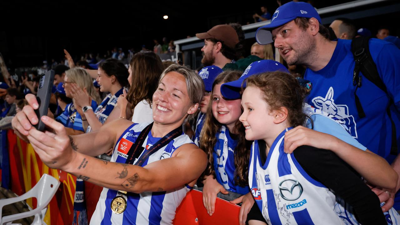 Sarah Wright enjoys the premiership win with fans after remarking she could have easily been watching on from the stands too on Saturday night. Picture: Dylan Burns / Getty Images