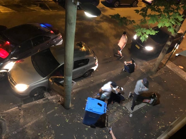 Kingi, Lim and Dilworth during their arrest on the side of Bourke St last month. Picture: Supplied