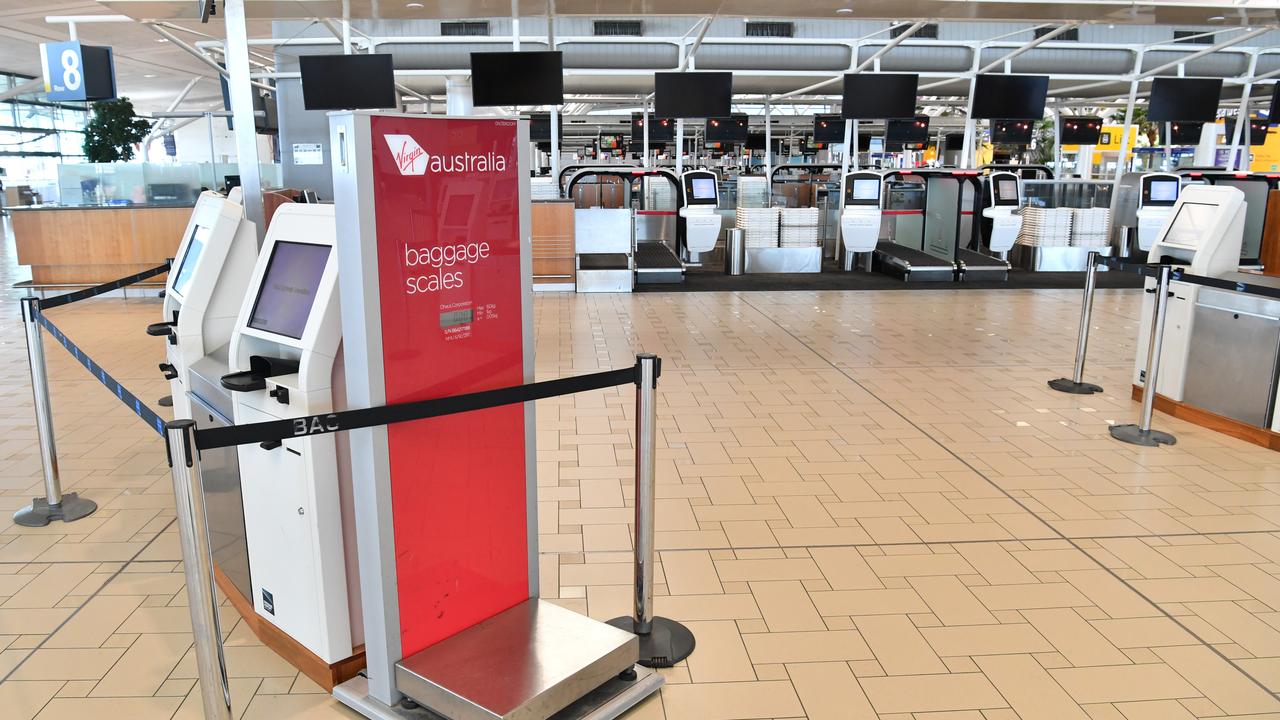 Airports have become virtual ghost towns in the grip of the pandemic. Picture: AAP / Darren England