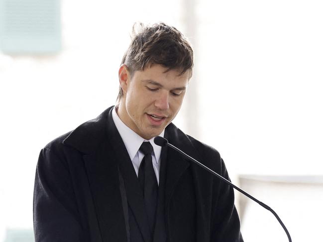 Riley Keough’s Australian husband, Ben Smith-Petersen, reads a tribute by his wife at the public memorial for Lisa Marie Presley at Graceland. Picture: Getty Images via AFP