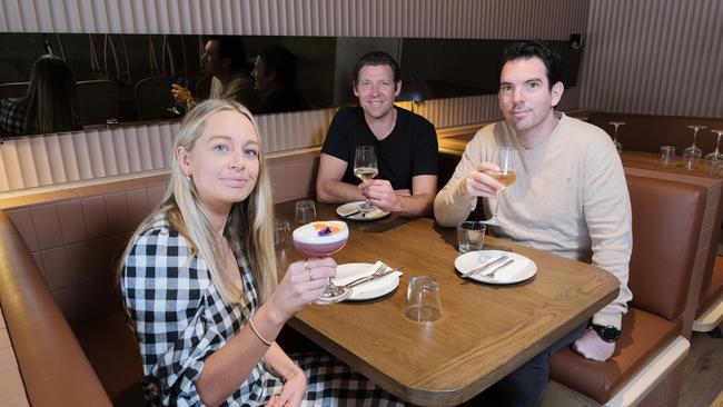 Bombaras co-owner Tom McGrath, pictured with Yasmin Burton and Josh Friend, said it was important for other big events to go ahead. Picture: Mark Wilson