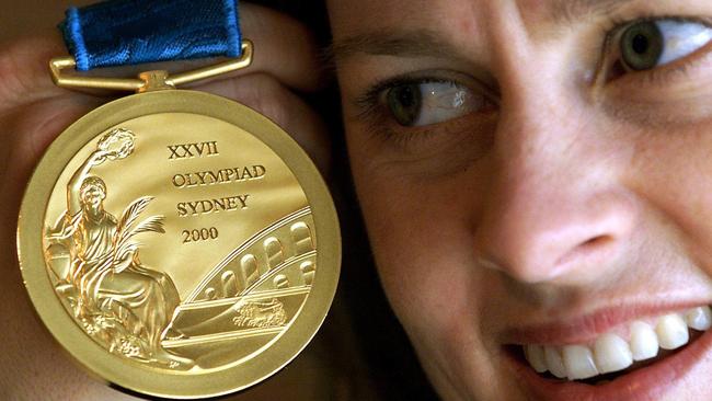 Danni Roche with her gold medal from the 2000 Olympic Games in Sydney.