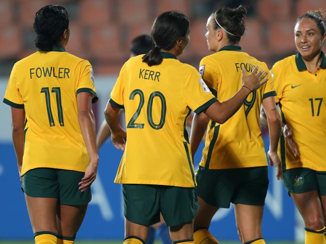 MUMBAI, INDIA - JANUARY 27: Sam Kerr (2nd L) of Australia celebrates scoring her side's second goal with her team mates during the AFC Women's Asian Cup Group B match between Australia and Thailand at Mumbai Football Arena on January 27, 2022 in Mumbai, India. (Photo by Thananuwat Srirasant/Getty Images)